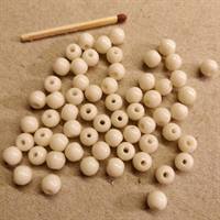 Bunke mælkehvide perler i 6 mm.